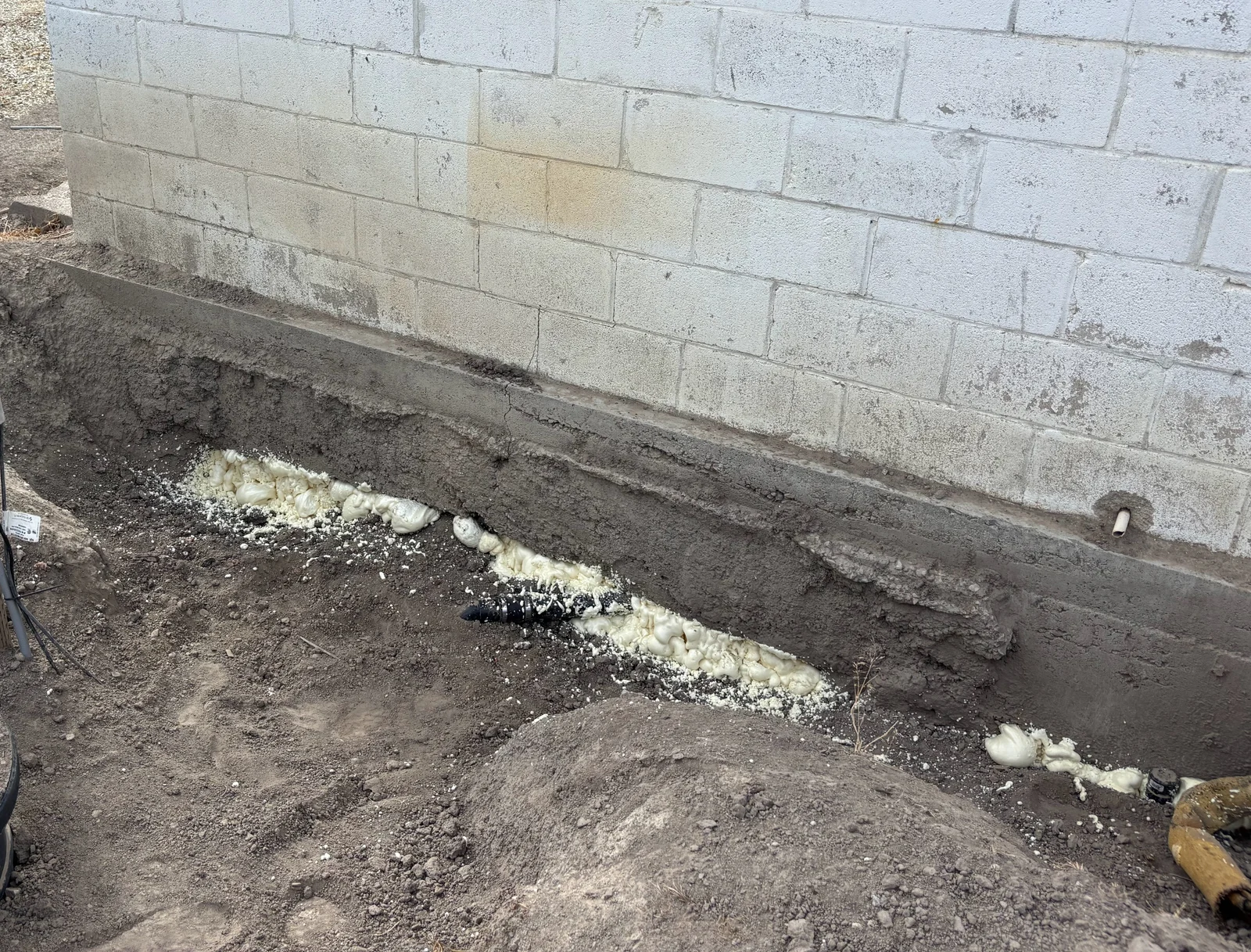Polyurethane foam filling a void underneath concrete